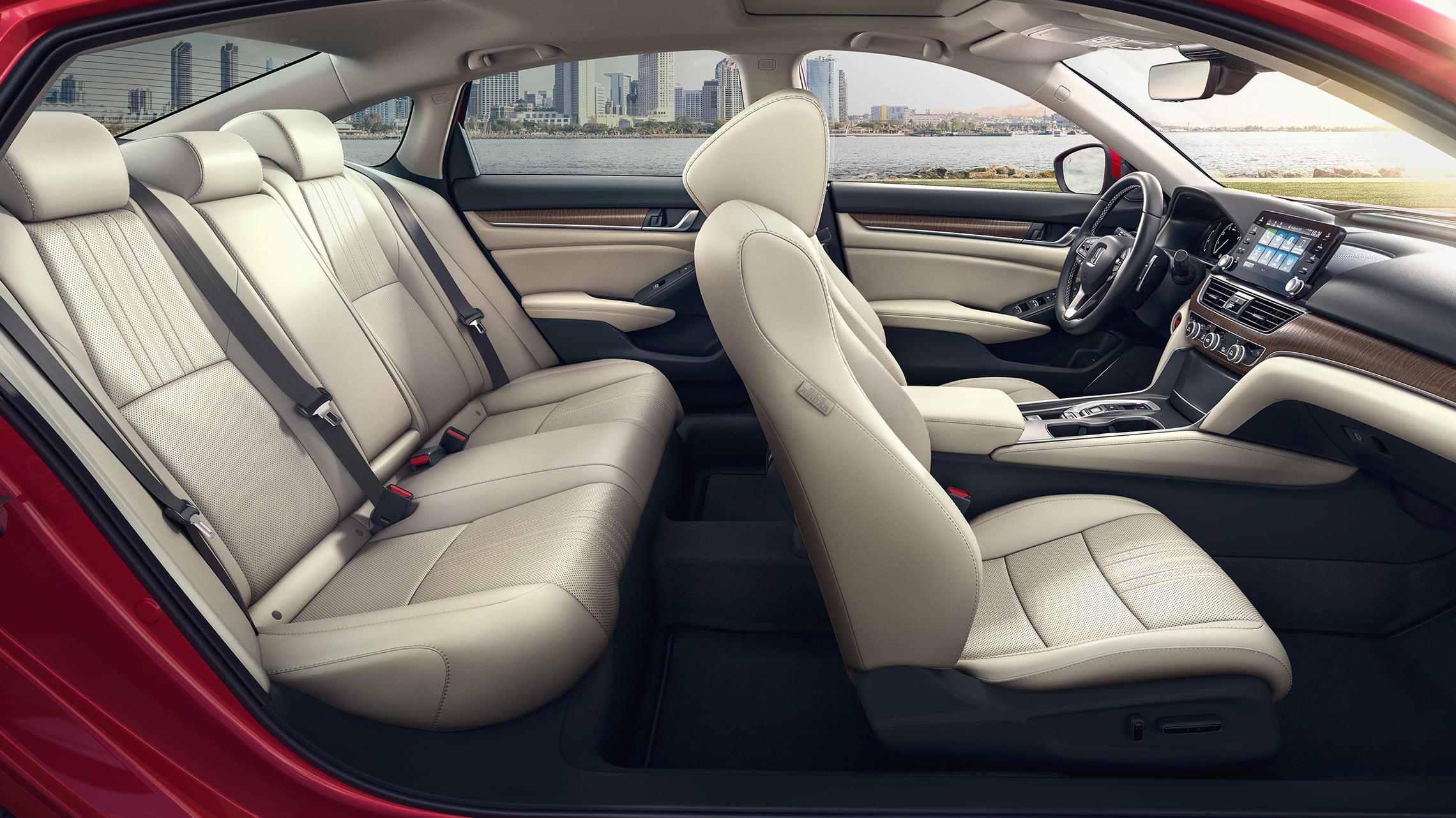 Passenger-side view of interior seats in the 2021 Honda Accord Touring 2.0T in Radiant Red Metallic with Ivory Leather.