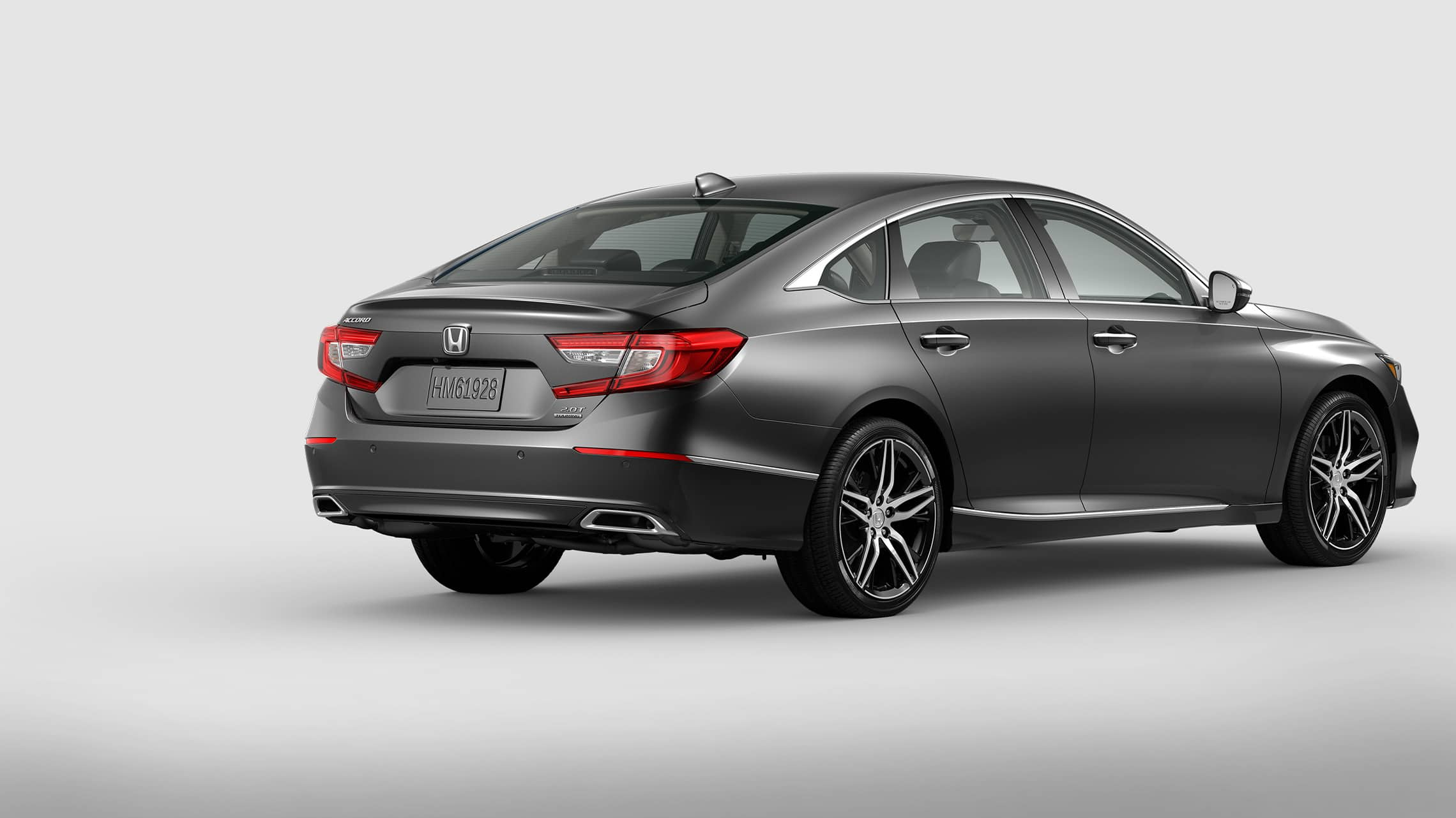 Rear passenger-side view of 2021 Honda Accord Touring 2.0T in Modern Steel Metallic.